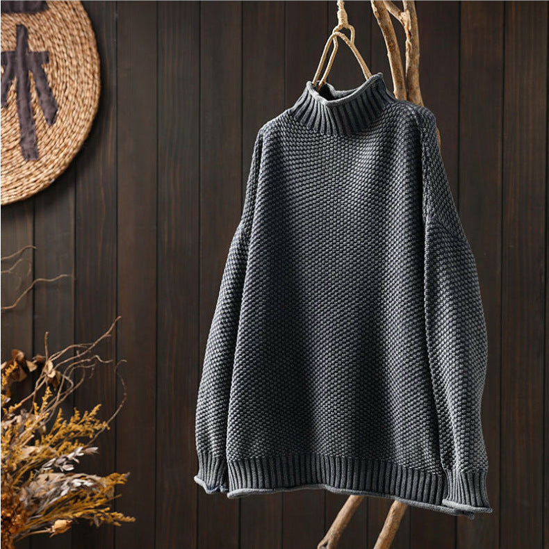 Maglione a collo alto con lavorazione a maglia a rombi tridimensionali
